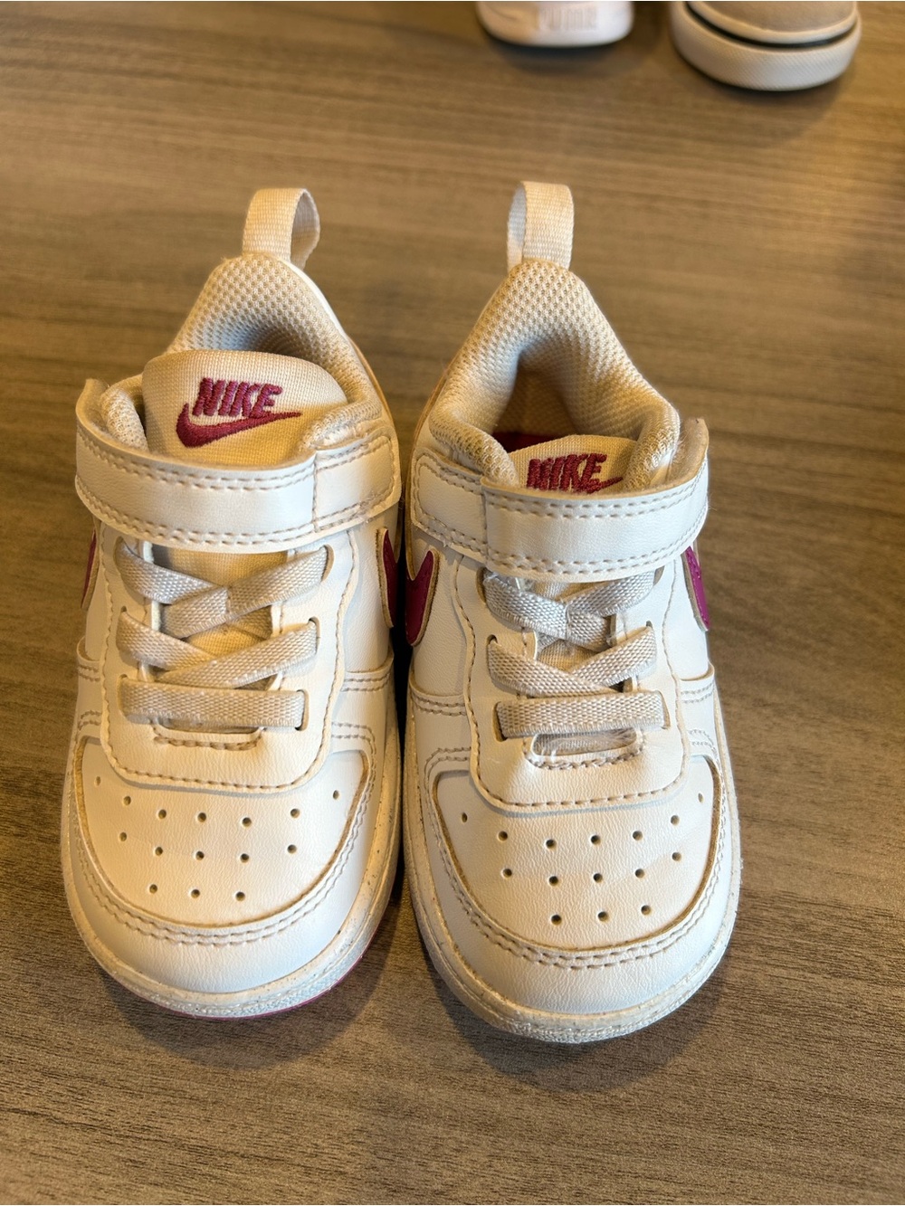 Nike Kids White Sneaker with Pink Swoosh